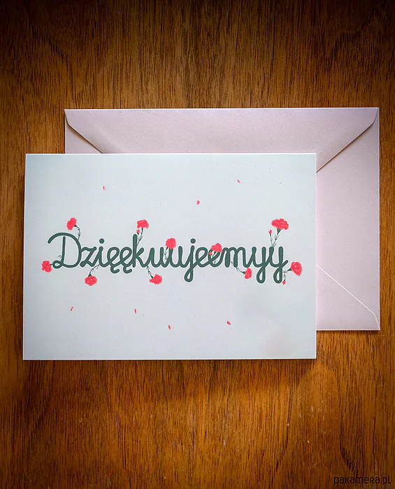 Kartka dla nauczyciela „Dziękujemy” — napis obsypany kwiatami